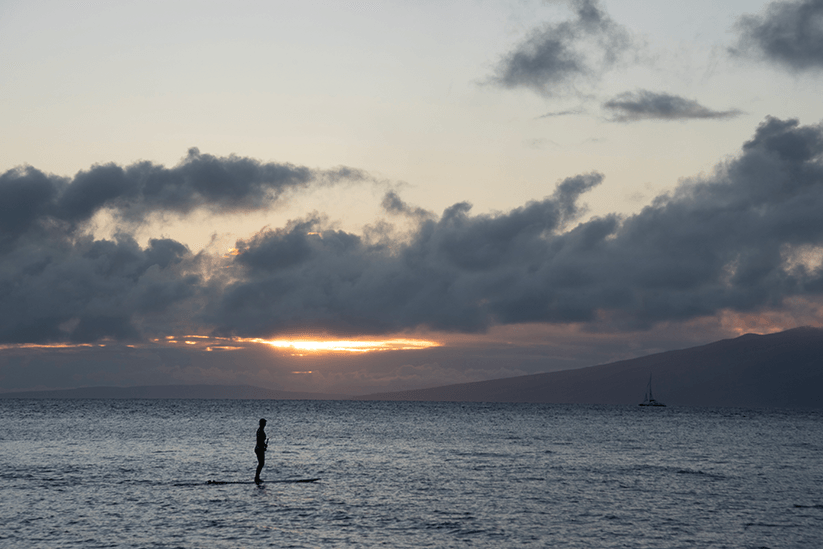 Stand Up Paddle boarder at Maui Sunset